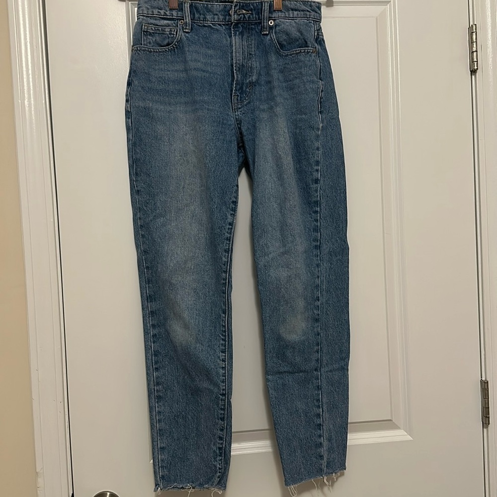 Medium wash high rise mom jean.